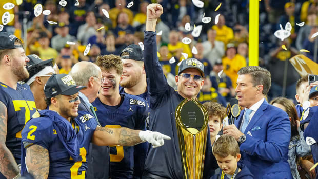 Harbaugh led Michigan to a national championship before leaving for the NFL.
